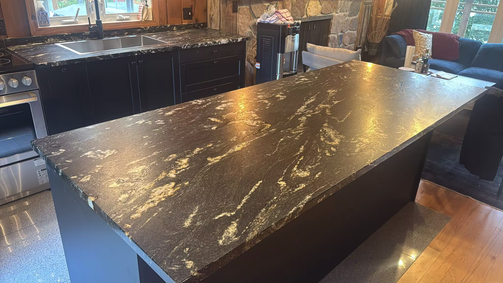 Luxury Ontario kitchen featuring a black and gold granite countertop installed by Stone Valley Countertops