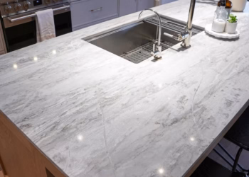 Close-up of HanStone Matterhorn quartz on the kitchen island with a rounded edge profile fabricated by Stone Valley Countertops.