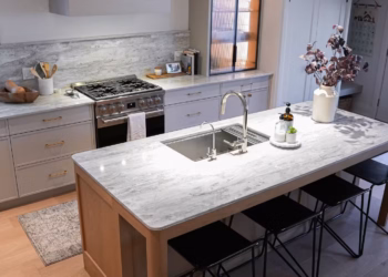 Luxury kitchen design featuring HanStone Matterhorn quartz countertops and an island.