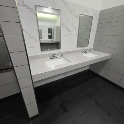 Quartz restroom vanity countertops with undermount sinks installed at OnRoute Port Hope Ontario