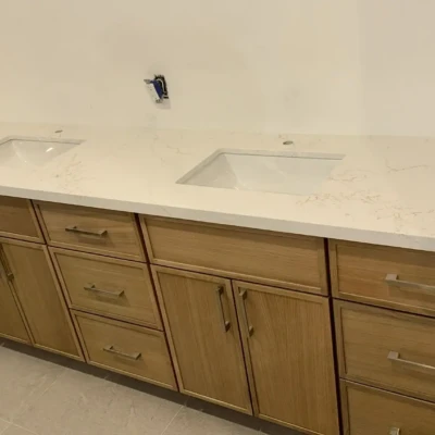 Quartz bathroom double vanity countertops with undermount sinks installed in Bewdley Ontario by Stone Valley Countertops